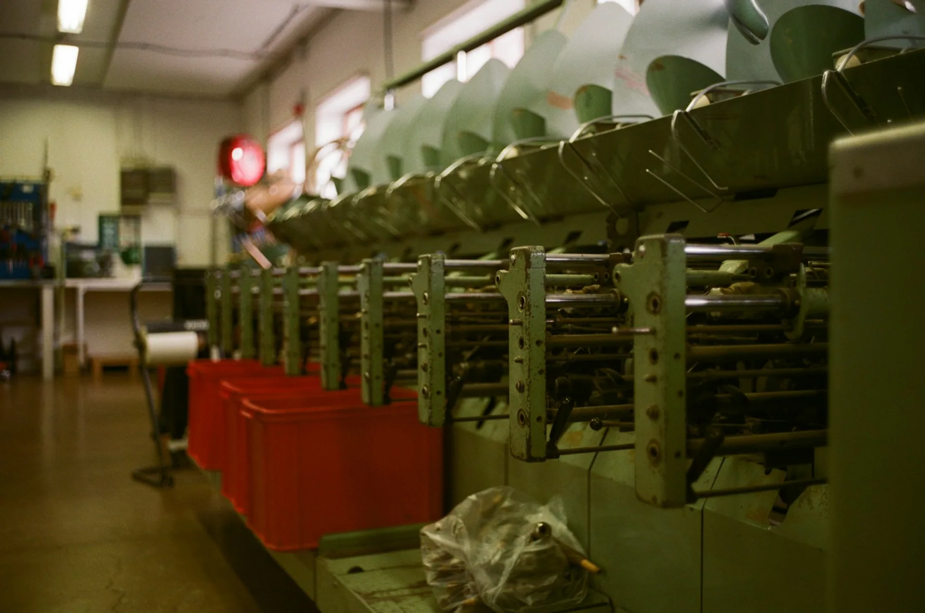 Installed industrial machinery inside a textile factory