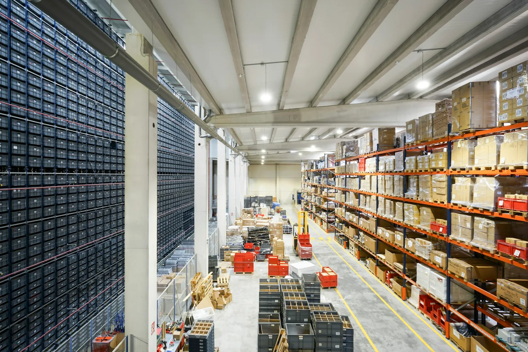 Warehouse storage racks filled with boxes and pallets